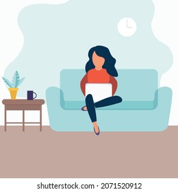 Young freelancer girl working at the computer.