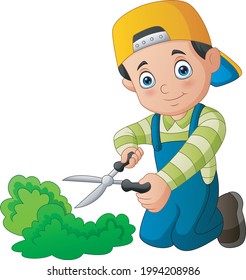 Young gardener trims a grass with scissors