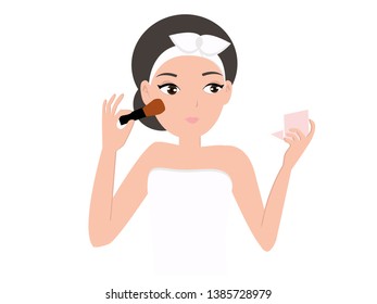 young girl Applying blush on her face