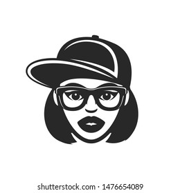 Young girl in baseball cap and glasses 