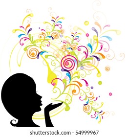 Young girl blowing abstract floral