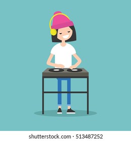 Young girl DJ wearing headphones and scratching a record on the turntable / flat editable vector illustration