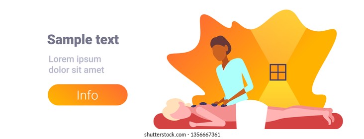 young girl enjoying traditional hot stone massage african american masseuse massaging patient woman hotel health spa concept horizontal banner portrait copy space