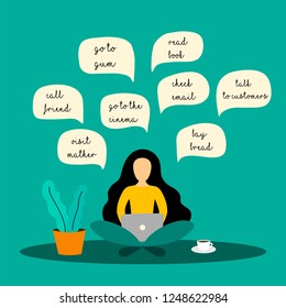 A young girl freelancer sits on the floor with a laptop and plans her work day. Concept of working at home. Young female blogger. 