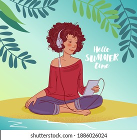 Young girl in headphones listening to music 