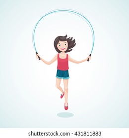 Young girl is jumping with a jump rope.