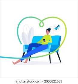 Young Girl Make Online Shoppings at Home on Sofa. Mobile Phone and Application