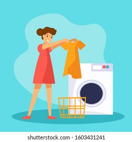 Young girl makes laundry at home. She standing near wash machine and holding clean dress in her hands. Flat vector illustration with female cartoon character.