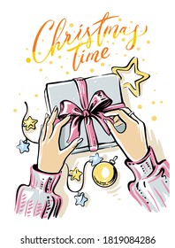 young girl packing gift for christmas
