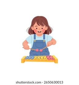 A young girl plays a xylophone with mallets, smiling happily.