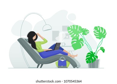 Young girl resting in chair with laptop