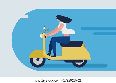 Young girl rides a two wheeler without wearing a helmet in the city