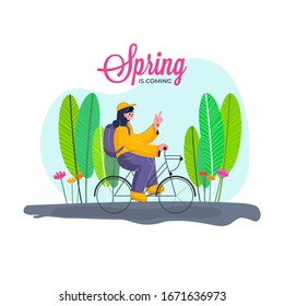 Young Girl Riding a Bicycle with Backpack, Flowers and Leaves for Spring Is Coming Concept.