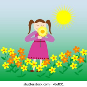 A young girl smelling the spring flowers in the sunshine.