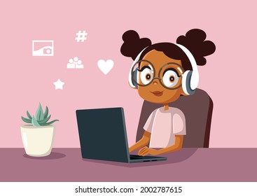 Young Girl Spending Time on Social Media on Her Laptop. Smiling child procrastinating homework while listening to music
