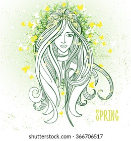 Young girl in spring mood as a symbol of awakening of nature 