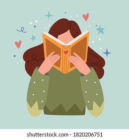 Young girl in sweater and warm  reading book.The girl is resting at home.Cozy autumn.