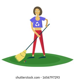 young girl sweeping trash in the park
