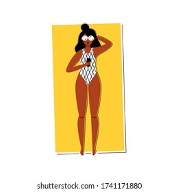 A young girl  in a swimsuit and sunglasses on the beach - Character sunbathing, holding a smartphone, view from above, summer relax - Vector flat illustration