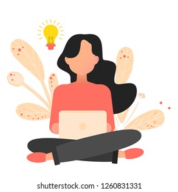 Young girl using computer, sitting legs crossed and coming up with ideas