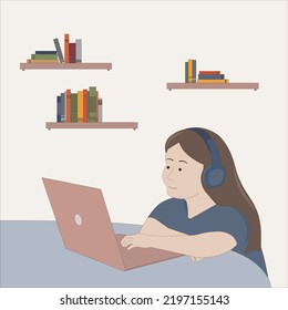Young girl using laptop while sitting at home