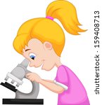 Young girl using microscope