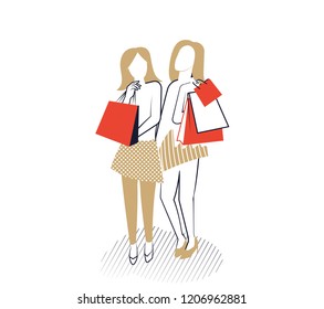 Young girls with shopping bags.