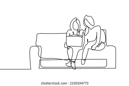 Young girls sitting on sofa at home looking at laptop together and standing relaxed. girlfriends at home hobby and lifestyle concept