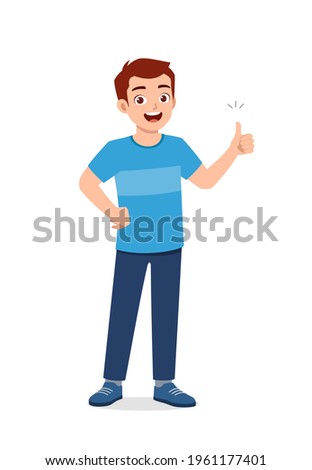 young good looking man doing thumb up pose