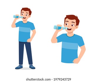 young good looking man drink water on bottle