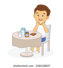 Young good looking man eat bread and drink mik