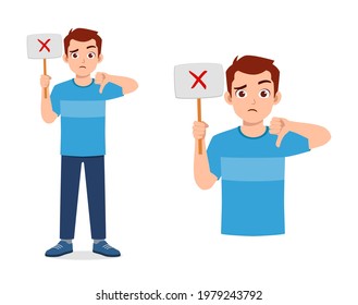young good looking man holding board said no