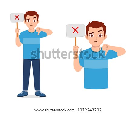 young good looking man holding board said no