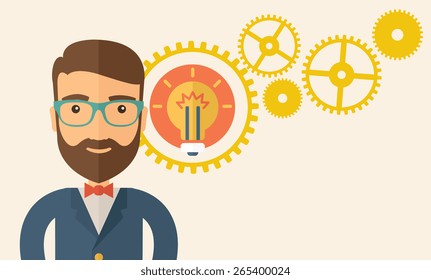 A young good looking, smart hipster Caucasian man with beard thinking a new bright idea, a different kind of imagination  inspired by bulb shape. Human intelligence concept.A contemporary style