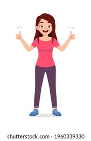 young good looking woman doing thumb up pose