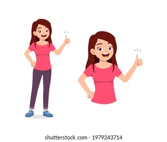 young good looking woman doing thumb up pose