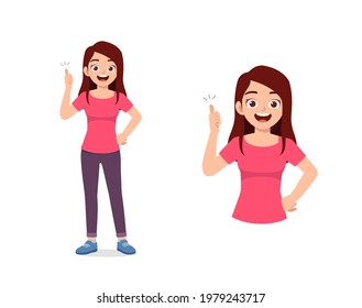 young good looking woman doing thumb up pose