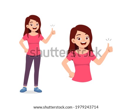 young good looking woman doing thumb up pose