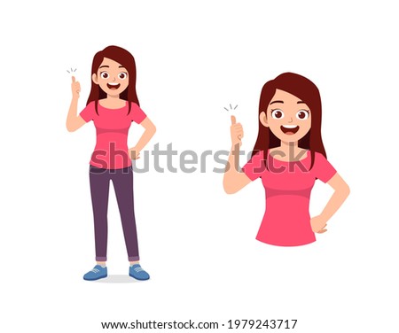 young good looking woman doing thumb up pose