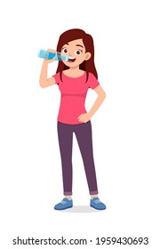 young good looking woman drink water on bottle