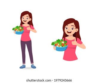 young good looking woman eat fruit and vegetable