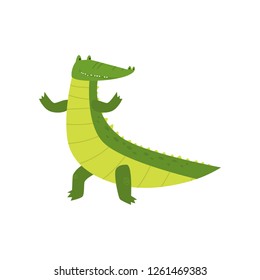 Young green cute cheerful crocodile spends his free time.