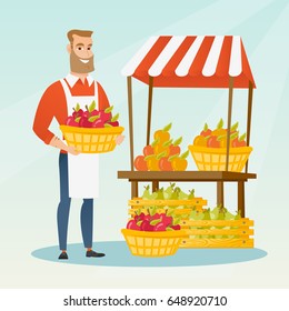 Young greengrocer standing near the stall with fruits and vegetables. Greengrocer standing near the market stall. Greengrocer holding basket with fruits. Vector flat design illustration. Square layout