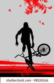 young guy doing exercise on a bicycle in the nature