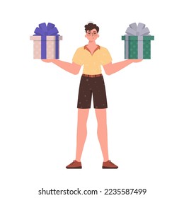 Un chico joven tiene un regalo. Estilo de carácter moderno.