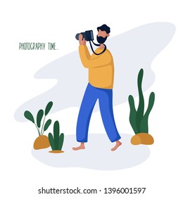 Young guy or man and his hobby or daily activity - photographing nature and landscapes, walking with a camera. Cute male character ion white background, flat style, vector illustration
