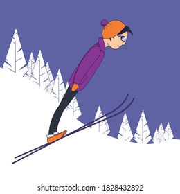 A young guy performs a jump on skis. Skiing. Winter sport. Ski resort.