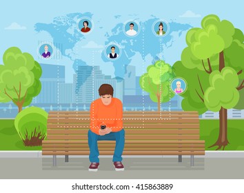 Young guy sitting in the modern city street park and using smartphone phone. Texting to friends in different parts of world. 