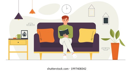 Young guy sitting on the couch is holding a book in his hand.Vector illustration of a cartoon character reading a book