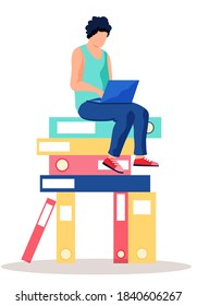 A young guy is sitting on a stack of folders or books. Guy with a laptop working on his computer. Freelancer at work at a distance. Online learning from home. Male character studying via the internet